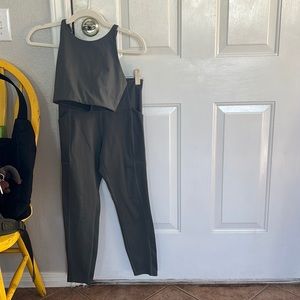 Girlfriend Collective matching leggings and bra set, size small.